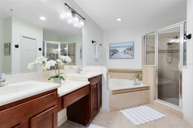 171 Mcleods Way, Winter Springs, FL 32708 - full bathroom with a stall shower, a bath, tile patterned floors, two vanities, and recessed lighting