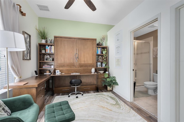 171 Mcleods Way, Winter Springs, FL 32708 - office area featuring wood finished floors, ceiling fan, and built in study area