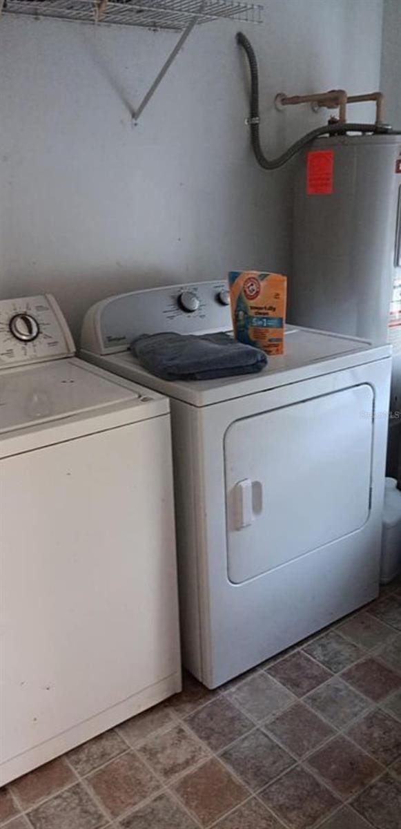 laundry room featuring washer and dryer and laundry area
