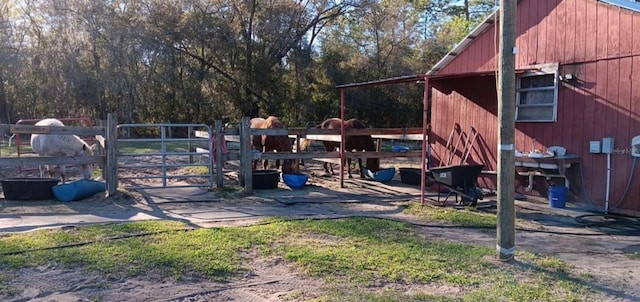 exterior space with fence and a gate