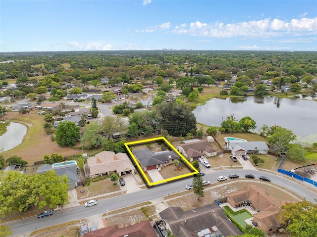 bird's eye view with a water view and a residential view