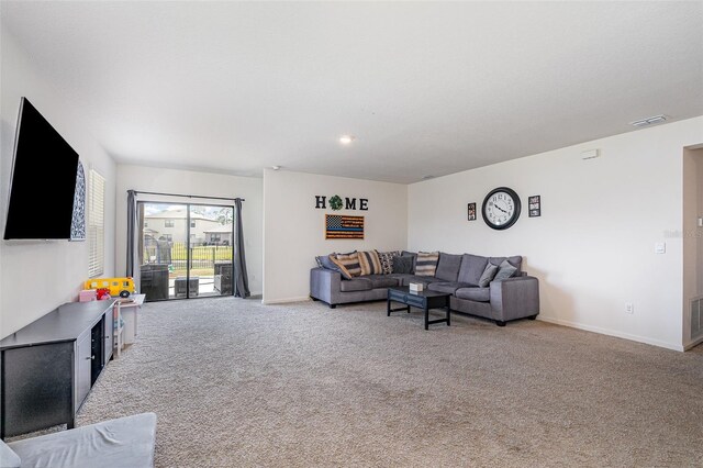 4601 Talbot Blvd, Cocoa, FL 32926 - carpeted living room with baseboards and visible vents