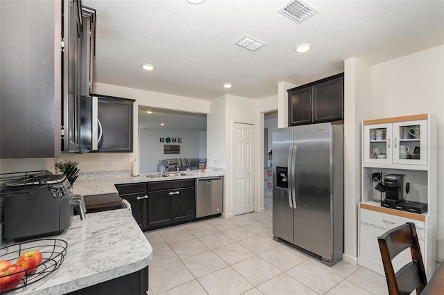 4601 Talbot Blvd, Cocoa, FL 32926 - kitchen with visible vents, light countertops, and stainless steel appliances