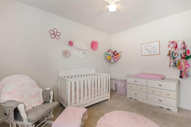 4601 Talbot Blvd, Cocoa, FL 32926 - bedroom featuring baseboards, carpet flooring, a crib, and ceiling fan