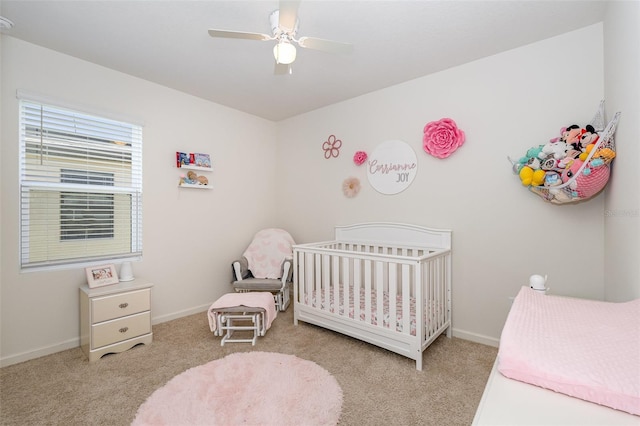 4601 Talbot Blvd, Cocoa, FL 32926 - bedroom featuring carpet floors, a nursery area, baseboards, and ceiling fan