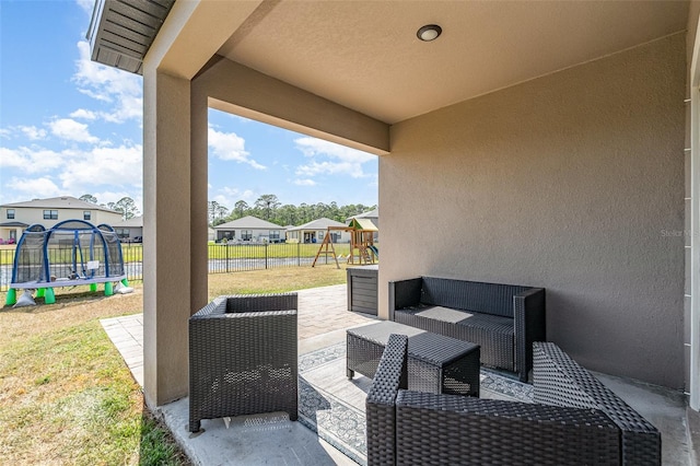 4601 Talbot Blvd, Cocoa, FL 32926 - view of patio / terrace with fence, a residential view, a trampoline, an outdoor hangout area, and a playground
