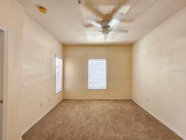 3577 Conroy Rd Unit 331, Orlando, FL 32839 - carpeted empty room with baseboards and ceiling fan