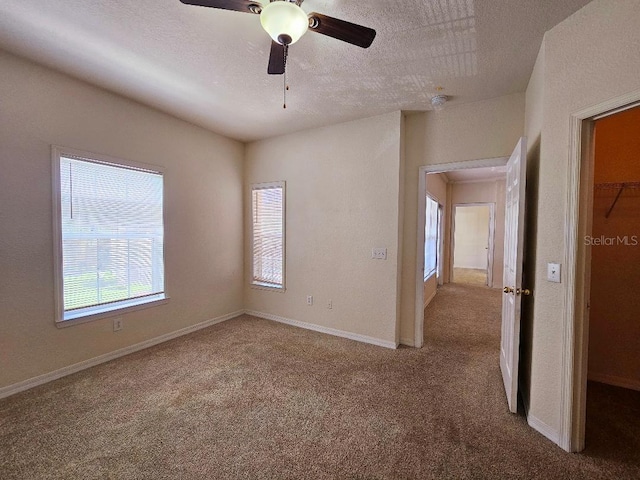 3577 Conroy Rd Unit 331, Orlando, FL 32839 - carpeted spare room with a ceiling fan and a textured ceiling