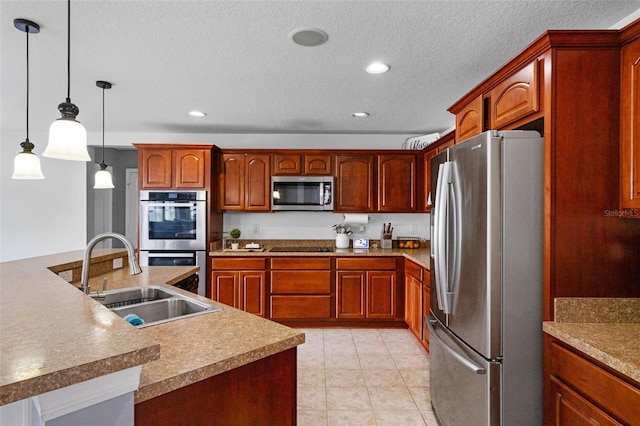 2806 Polson Dr, Kissimmee, FL 34758 - kitchen with stainless steel appliances, a sink, recessed lighting, pendant lighting, and a large island