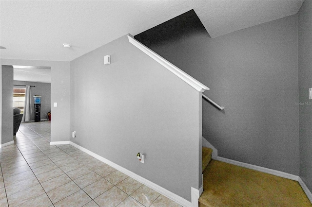 2806 Polson Dr, Kissimmee, FL 34758 - staircase with tile patterned floors and baseboards