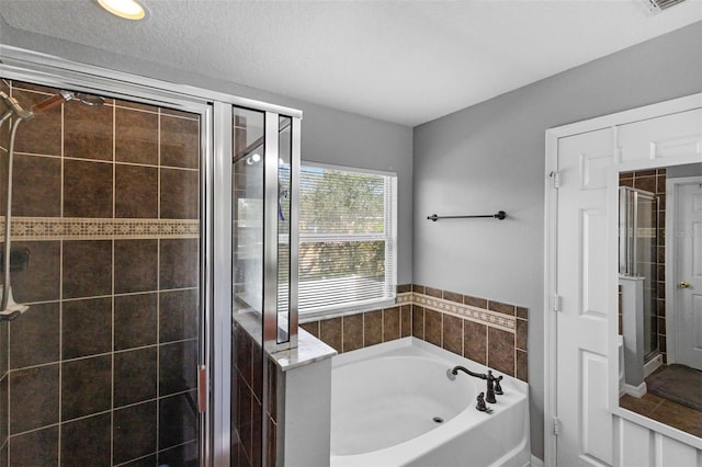 2806 Polson Dr, Kissimmee, FL 34758 - bathroom featuring a shower stall and a bath