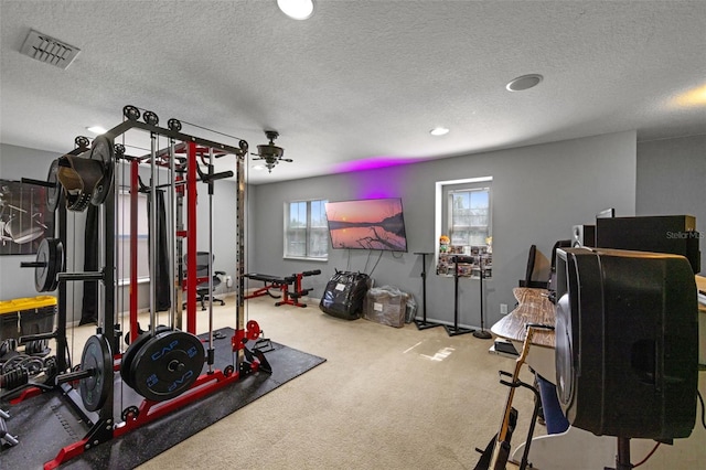 2806 Polson Dr, Kissimmee, FL 34758 - exercise area with carpet, a textured ceiling, and recessed lighting