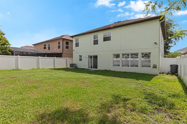 2806 Polson Dr, Kissimmee, FL 34758 - back of property with stucco siding and cooling unit