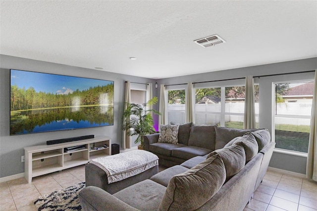 2806 Polson Dr, Kissimmee, FL 34758 - living area with light tile patterned floors and baseboards