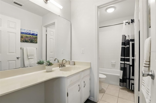 1136 Villa Ln Unit 96, Apopka, FL 32712 - bathroom featuring shower / bath combination with curtain, visible vents, tile patterned floors, vanity, and toilet