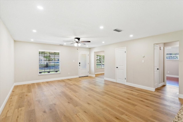 5162 Tellson Pl, Orlando, FL 32812 - empty room with visible vents, recessed lighting, and light wood-style floors