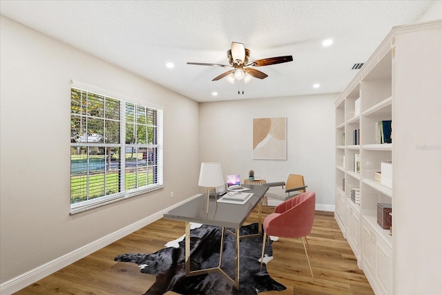 5162 Tellson Pl, Orlando, FL 32812 - office with a ceiling fan, baseboards, recessed lighting, wood finished floors, and visible vents