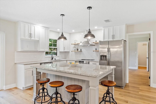 5162 Tellson Pl, Orlando, FL 32812 - kitchen featuring a sink, appliances with stainless steel finishes, tasteful backsplash, and open shelves