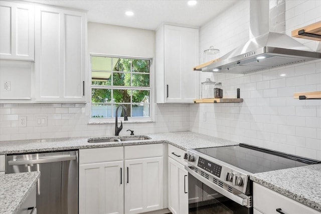 5162 Tellson Pl, Orlando, FL 32812 - kitchen with wall chimney range hood, decorative backsplash, appliances with stainless steel finishes, open shelves, and a sink