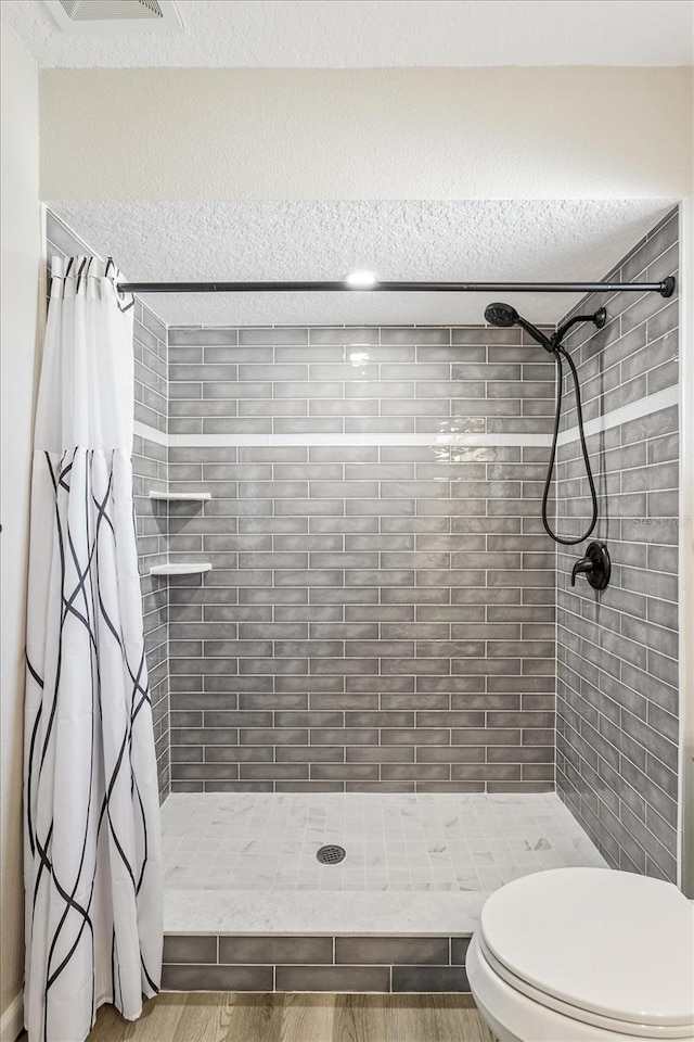 5162 Tellson Pl, Orlando, FL 32812 - full bathroom with a shower stall and toilet