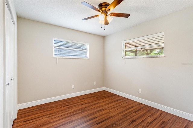 5162 Tellson Pl, Orlando, FL 32812 - empty room with baseboards, wood finished floors, and a wealth of natural light