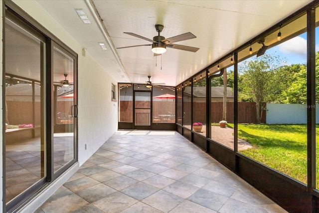 5162 Tellson Pl, Orlando, FL 32812 - unfurnished sunroom featuring ceiling fan