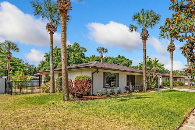 5162 Tellson Pl, Orlando, FL 32812 - ranch-style house featuring stucco siding, a front yard, and fence