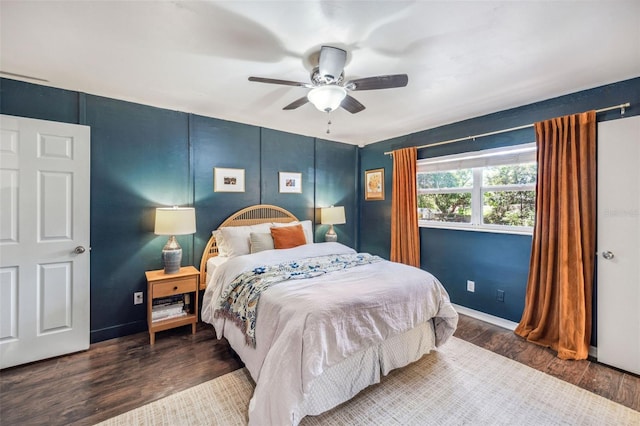8619 Veridian Dr, Orlando, FL 32810 - bedroom with baseboards, ceiling fan, and wood finished floors