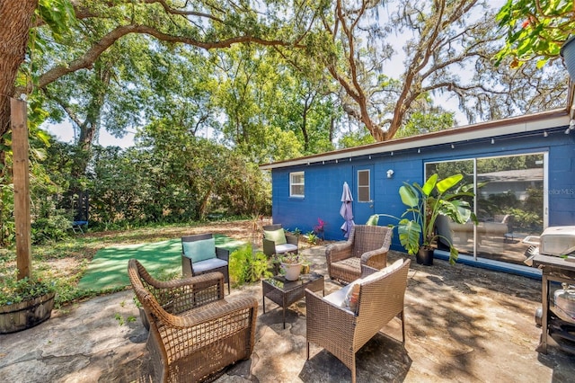8619 Veridian Dr, Orlando, FL 32810 - view of patio / terrace with an outdoor living space