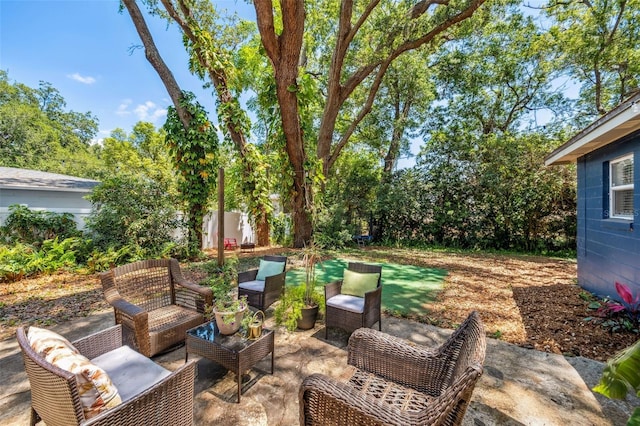 8619 Veridian Dr, Orlando, FL 32810 - view of patio / terrace with outdoor lounge area