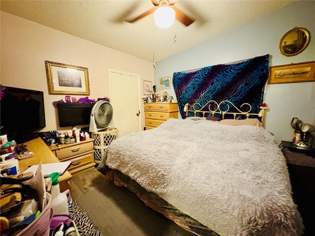 116 Lincoln Ave Unit 116-118, Cape Canaveral, FL 32920 - bedroom featuring a textured ceiling and a ceiling fan