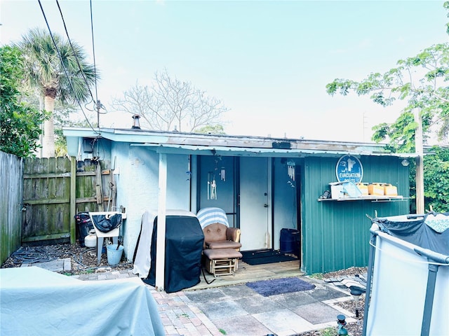 116 Lincoln Ave Unit 116-118, Cape Canaveral, FL 32920 - back of house featuring stucco siding