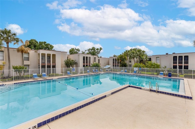 community pool with fence