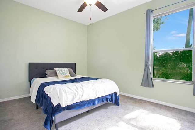 4219 Lillian Hall Ln, Orlando, FL 32812 - carpeted bedroom featuring baseboards and a ceiling fan