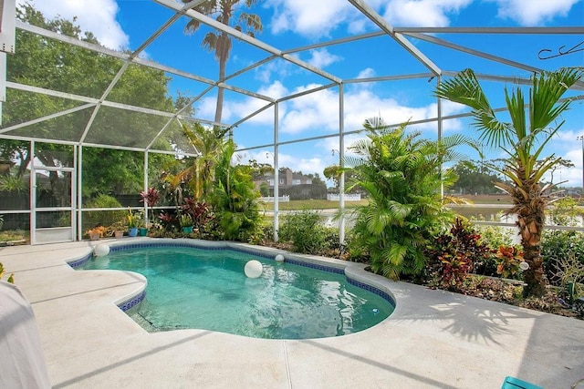 4219 Lillian Hall Ln, Orlando, FL 32812 - outdoor pool with glass enclosure and a patio area