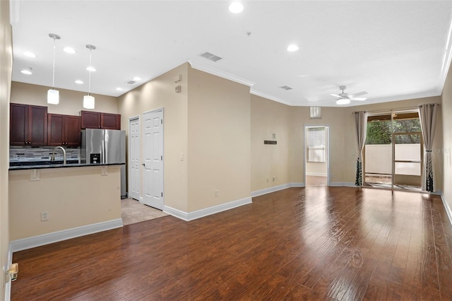 8031 Enchantment Dr Unit Ge, Windermere, FL 34786 - unfurnished living room with light wood-style flooring, visible vents, baseboards, ceiling fan, and recessed lighting