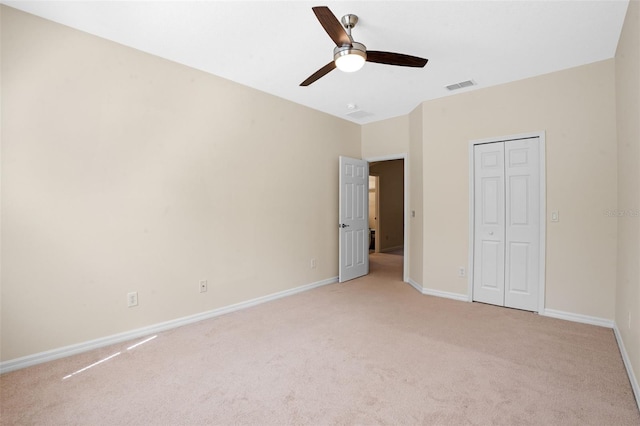 8031 Enchantment Dr Unit Ge, Windermere, FL 34786 - unfurnished bedroom with light colored carpet, baseboards, and visible vents