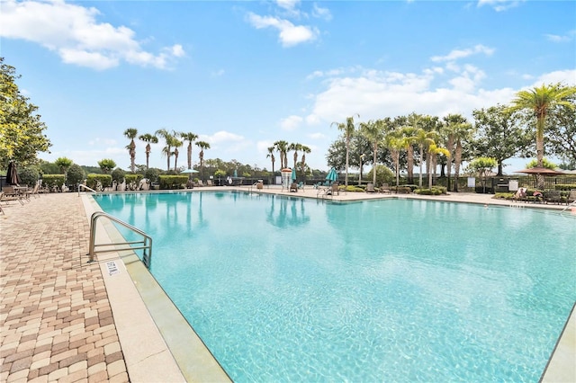 pool with a patio area
