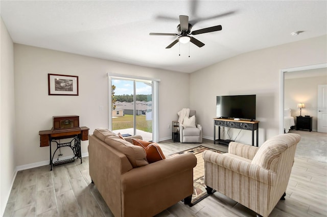 5347 Travertine St, Mount Dora, FL 32757 - living area featuring light wood finished floors, a ceiling fan, baseboards, and lofted ceiling
