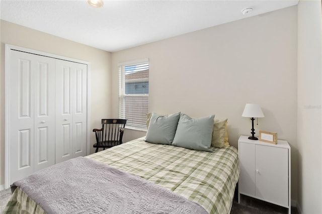 5347 Travertine St, Mount Dora, FL 32757 - bedroom with a closet, dark carpet, and baseboards