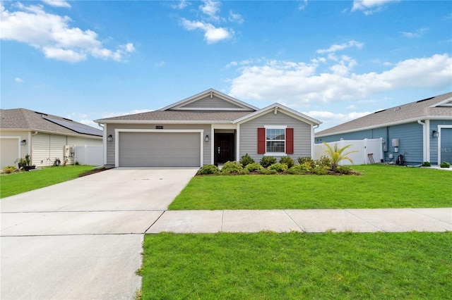 5347 Travertine St, Mount Dora, FL 32757 - ranch-style home featuring an attached garage and driveway