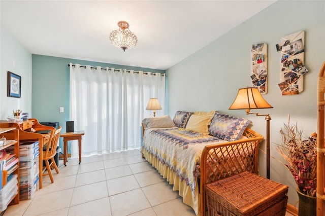 bedroom featuring light tile patterned floors