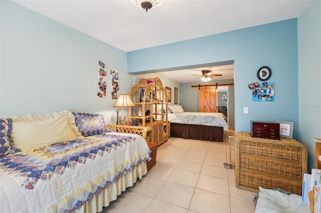 bedroom with ceiling fan and light tile patterned flooring