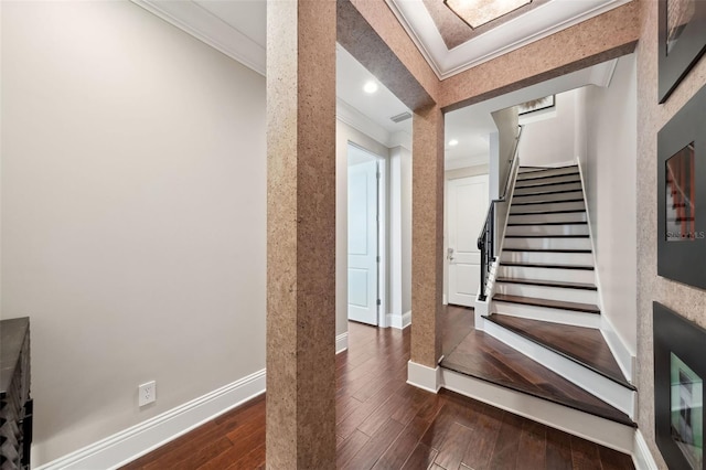 stairs with crown molding, baseboards, recessed lighting, and wood finished floors