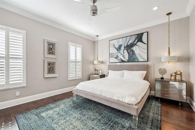 bedroom with crown molding, a ceiling fan, baseboards, and wood finished floors