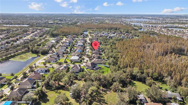11818 Gilmerton Dr, Riverview, FL 33579 - bird's eye view with a wooded view, a water view, and a residential view