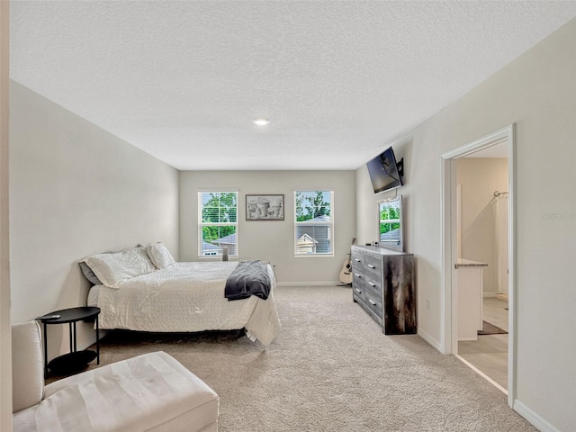 3033 Beau Loop, Tavares, FL 32778 - bedroom featuring a textured ceiling, baseboards, and light colored carpet