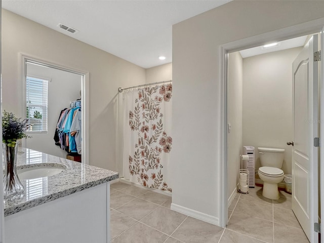 3033 Beau Loop, Tavares, FL 32778 - bathroom featuring visible vents, tile patterned flooring, vanity, toilet, and a shower with shower curtain