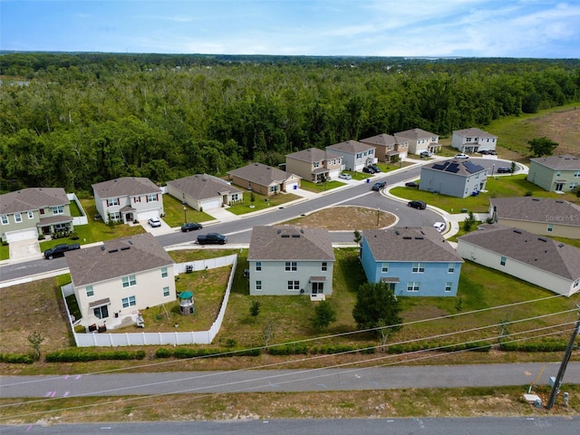 3033 Beau Loop, Tavares, FL 32778 - bird's eye view featuring a residential view and a wooded view
