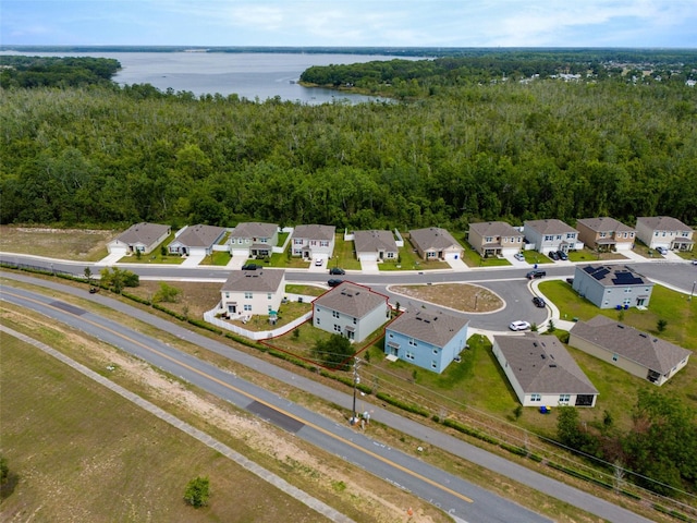 3033 Beau Loop, Tavares, FL 32778 - drone / aerial view featuring a water view, a residential view, and a wooded view